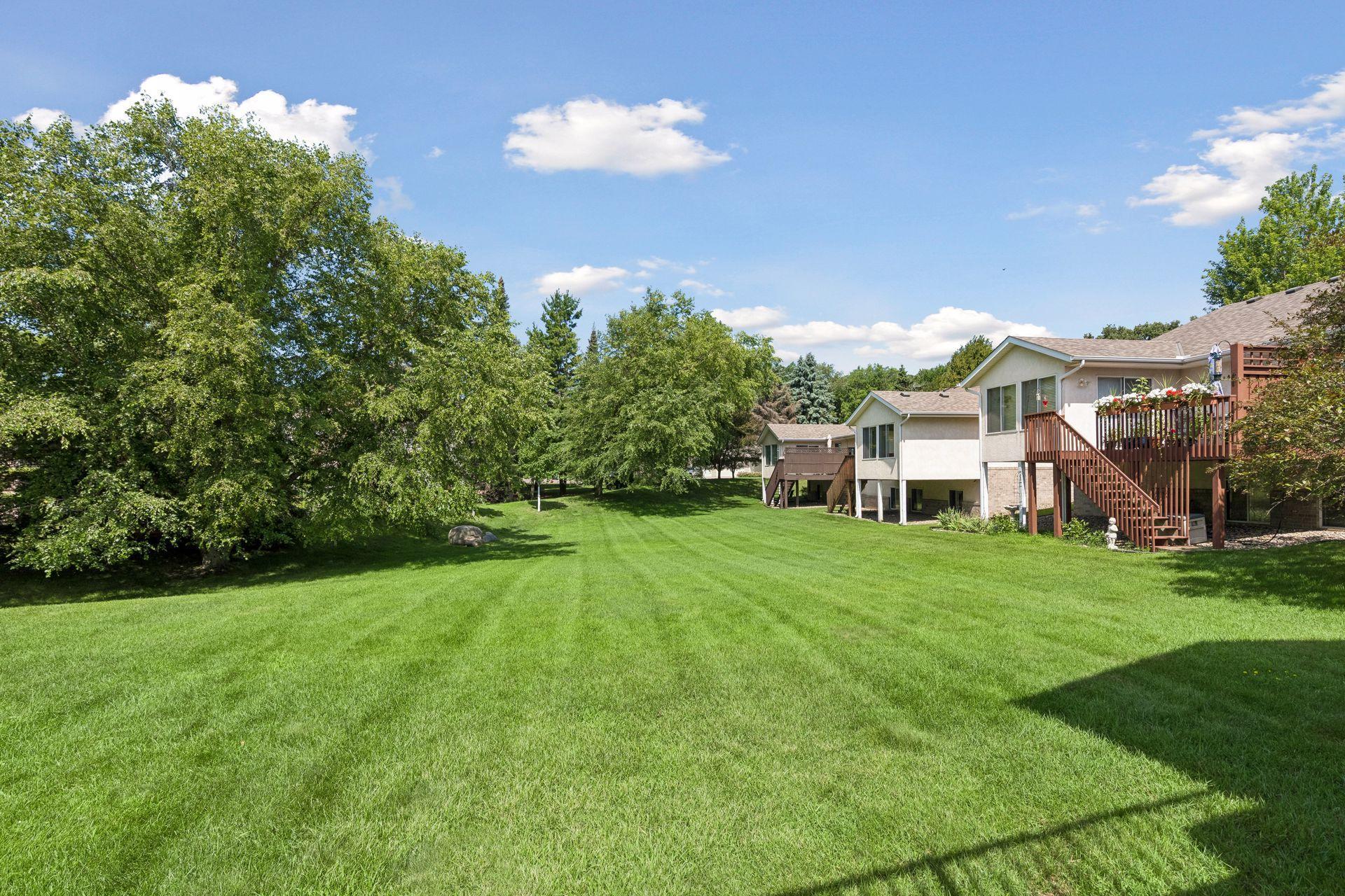 view of your yard from either the deck or the patio