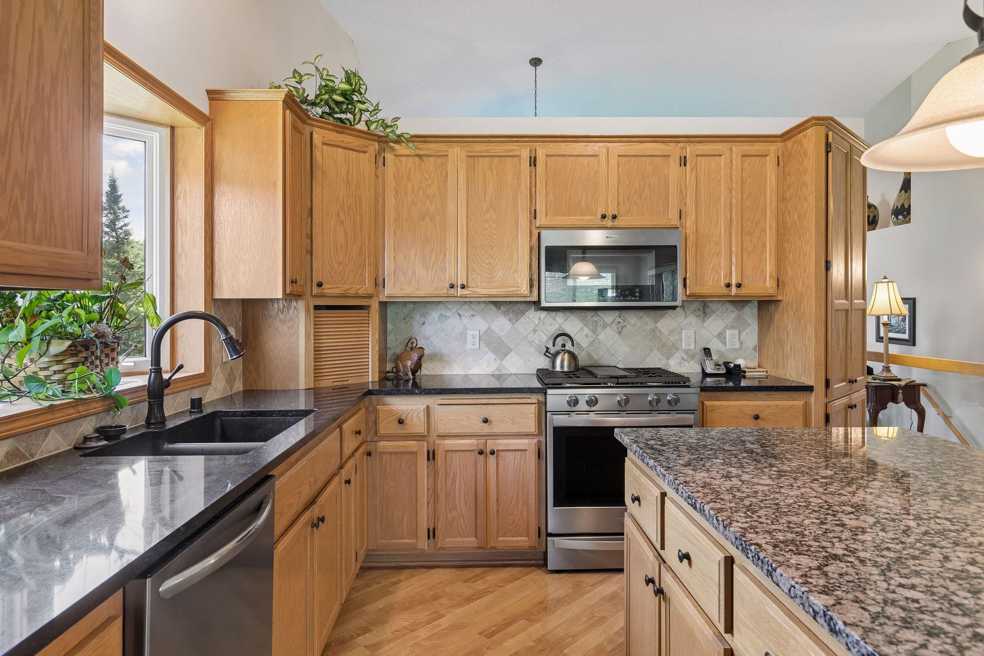 corner Appliance garage, new tile backsplash, and new appliances