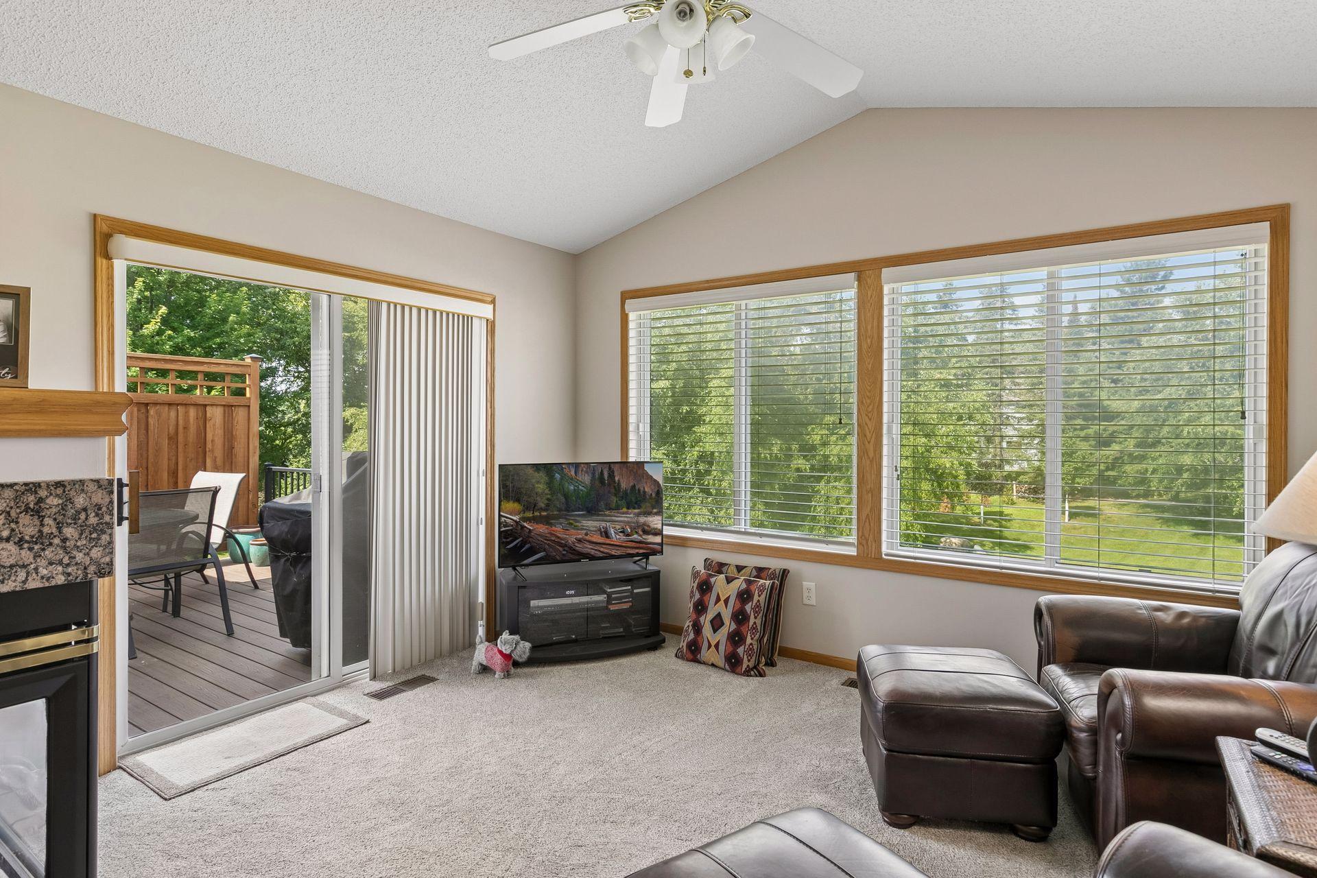 Main level family room walks out to the deck