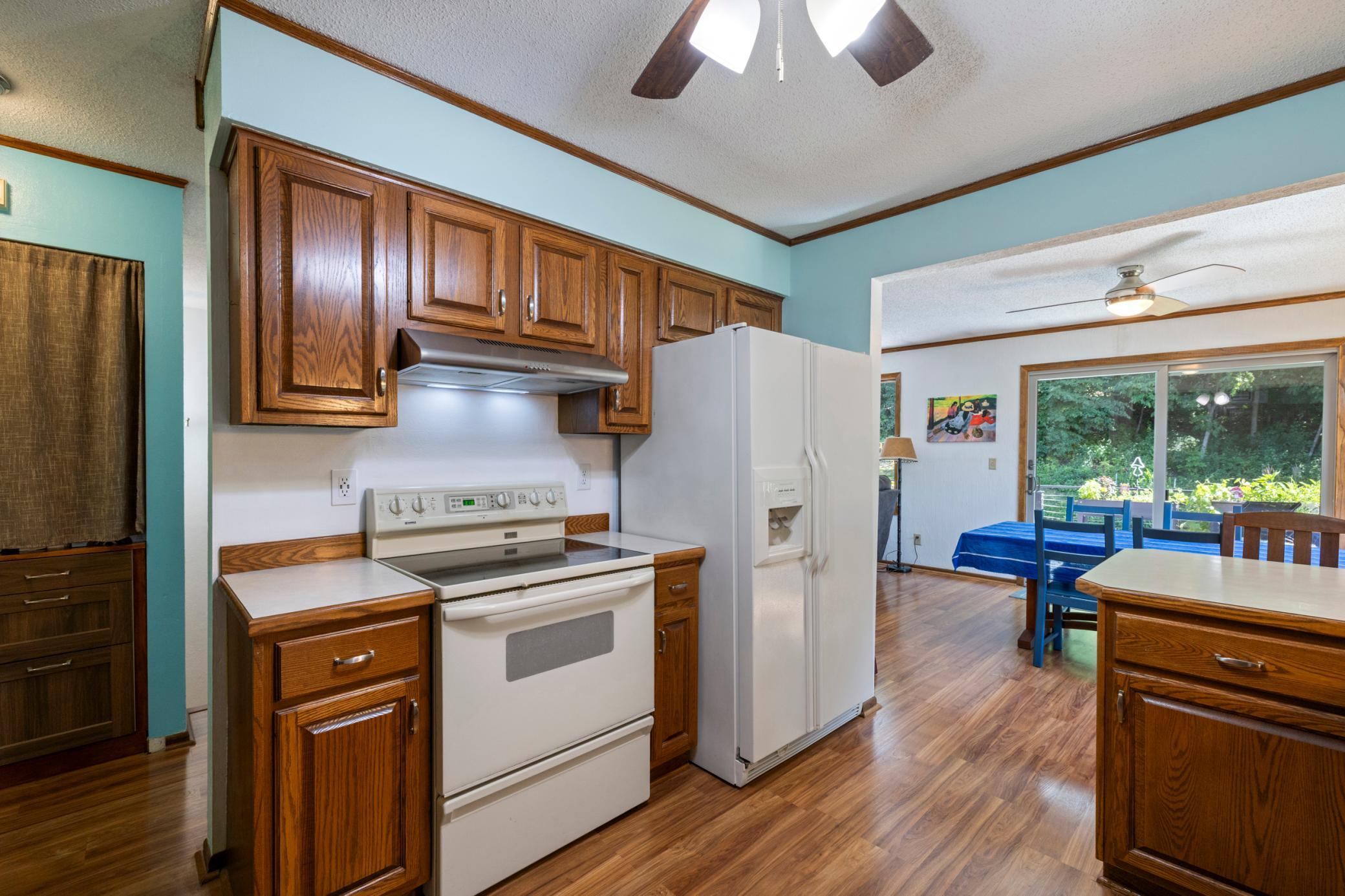 Kitchen and informal dining area flow seamlessly together