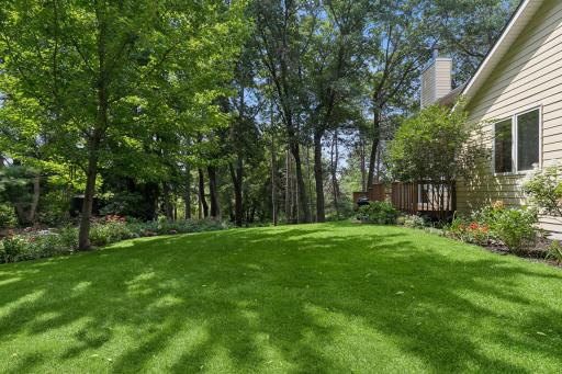 Look at this beautiful lot filled with mature trees, perennial gardens, and room for vegetable gardens.