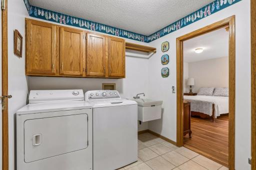 Main level laundry - connects to house and apartment with separate entrances.