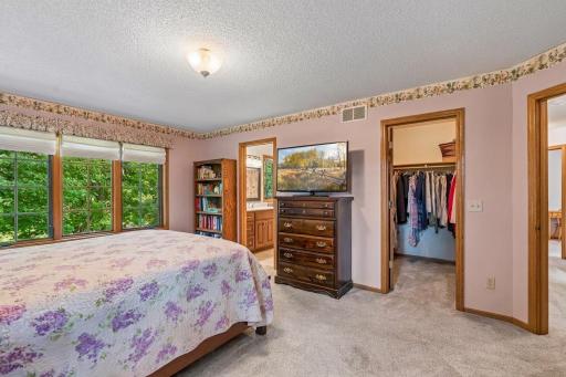 The primary bedroom has a walk-in closet and a private full bath