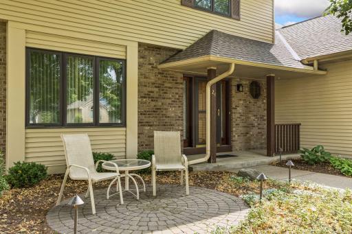 Enjoy a cup of coffee on the front paver patio