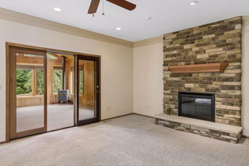 Step into the four season porch from the living room