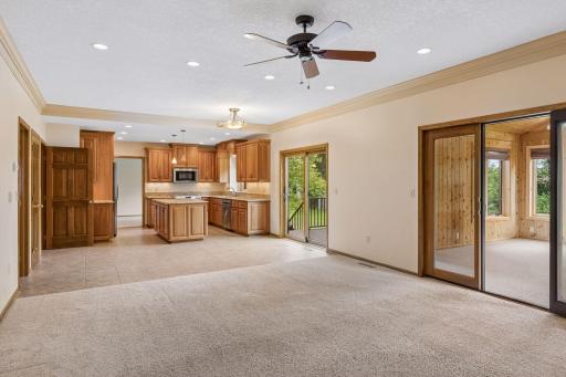 View from family room into informal eating area and kitchen