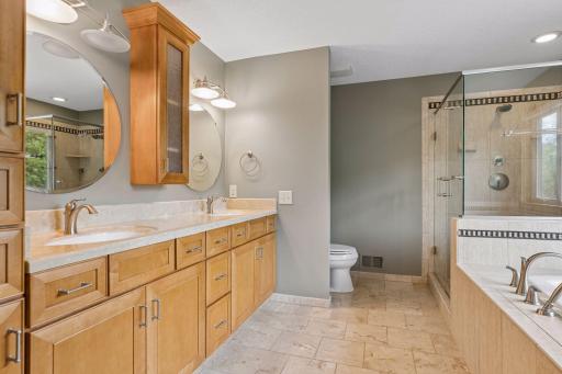Enjoy dual vanities with plenty of storage