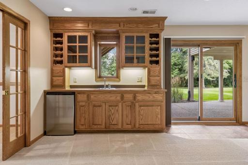 This kitchenette with window above the sink is perfect for entertaining and guests