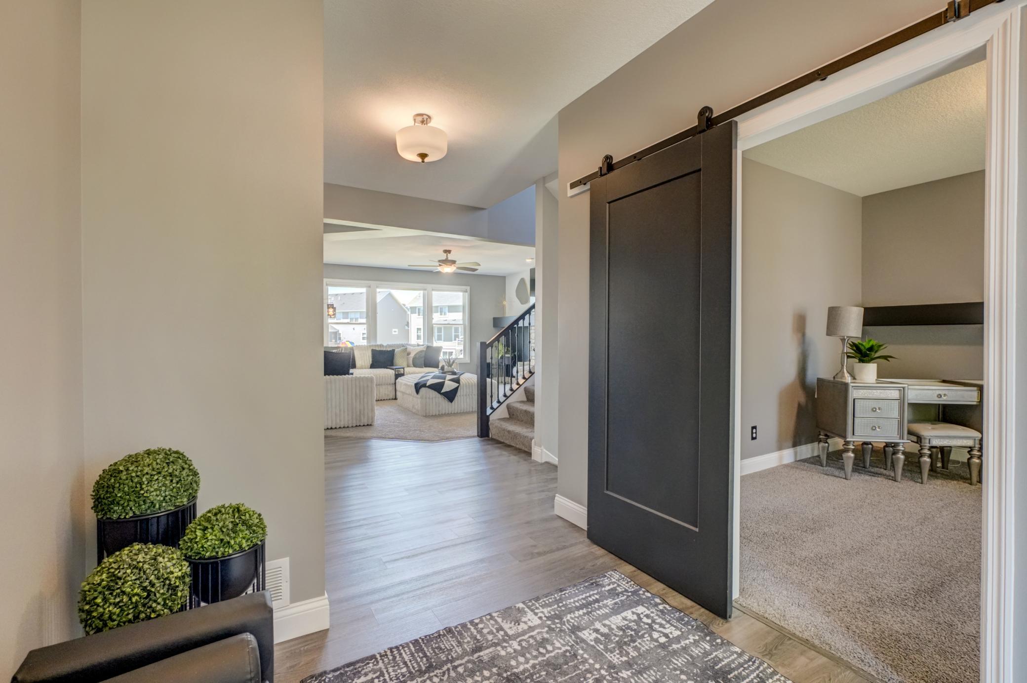 Step inside to a bright, welcoming entry that opens to thoughtfully designed living spaces throughout!
