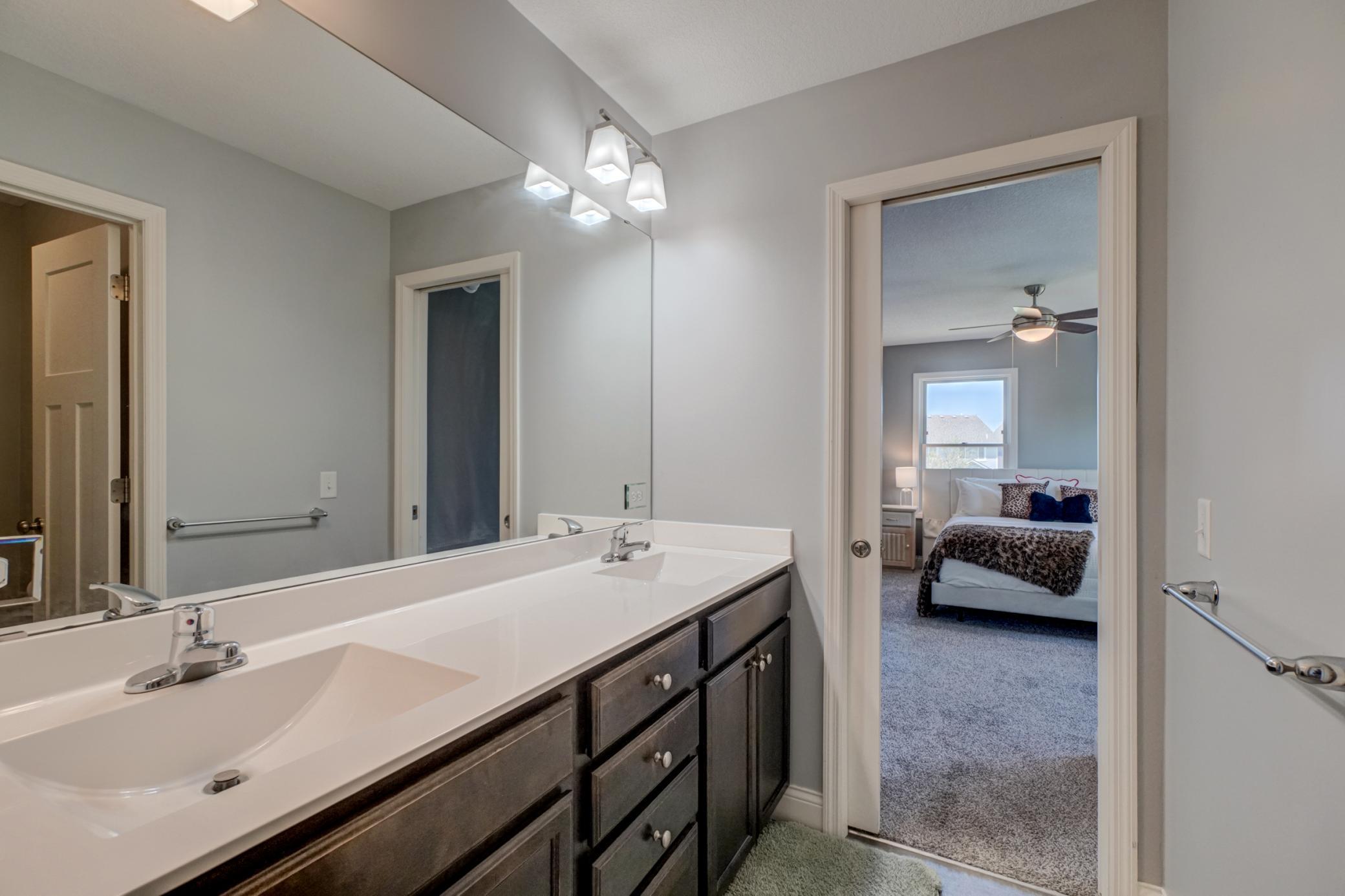 A highly sought after Jack and Jill bath services these two spacious upper level bedrooms