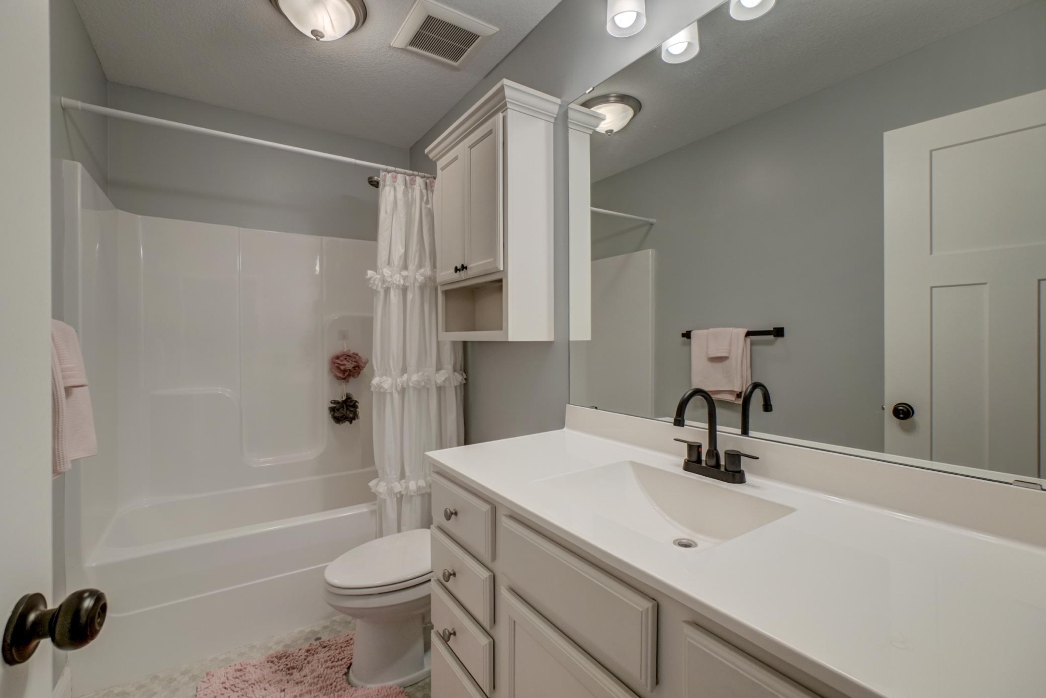 Connected ensuite bathroom provides private access