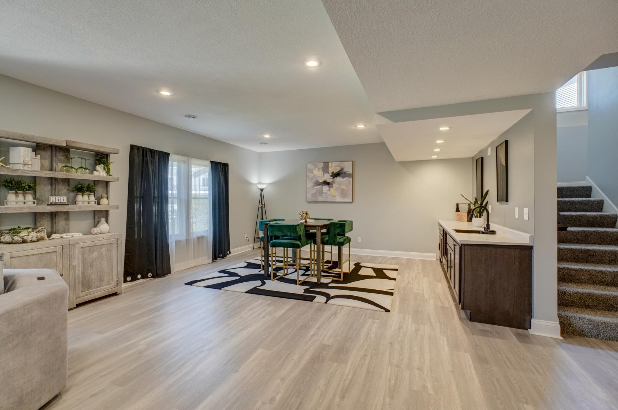 Designed for comfort and entertaining, this spacious lower level offers endless possibilities with the luxury of heated floors!