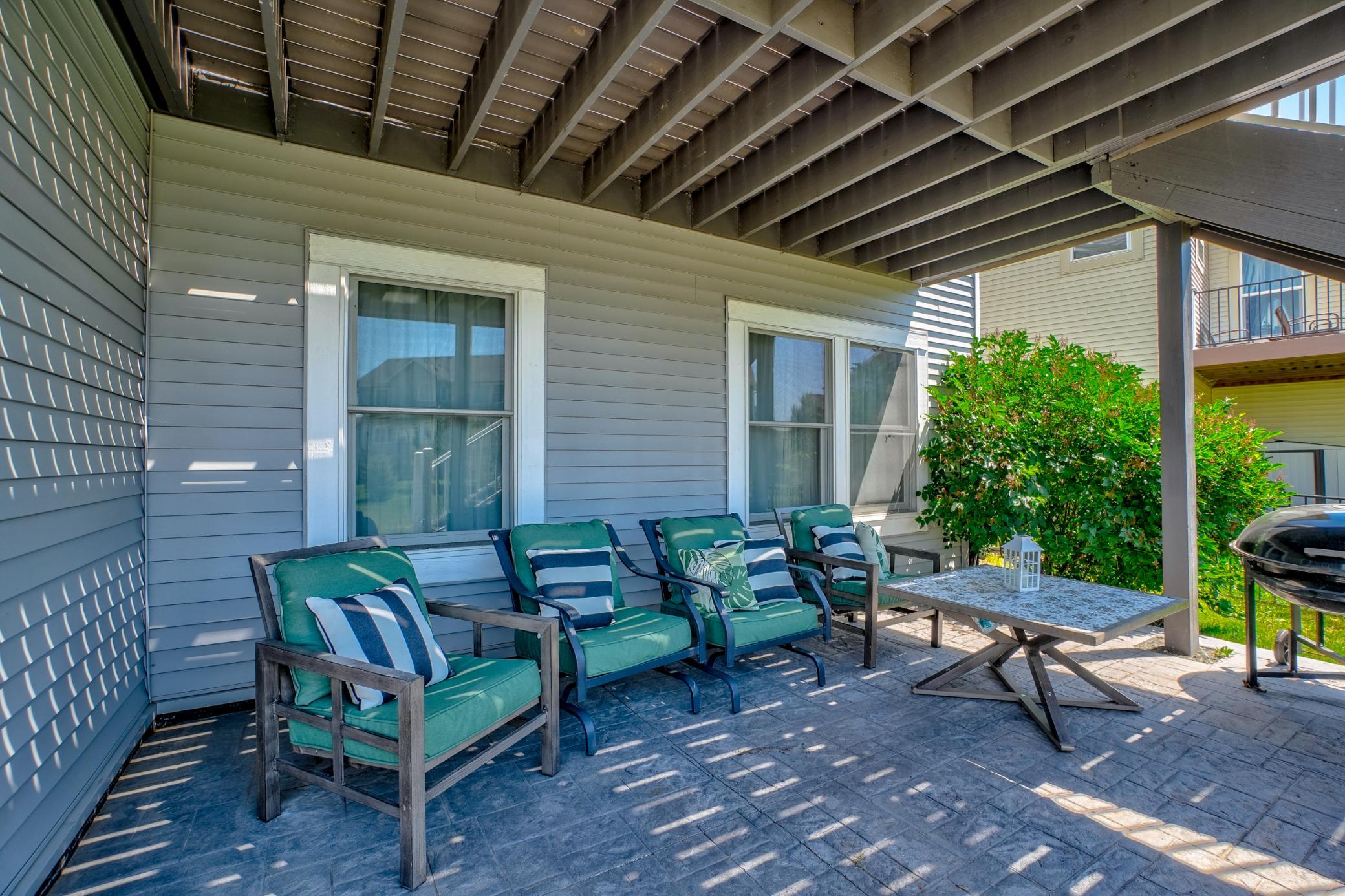 The stamped concrete patio is the perfect place for outdoor dining and entertaining!