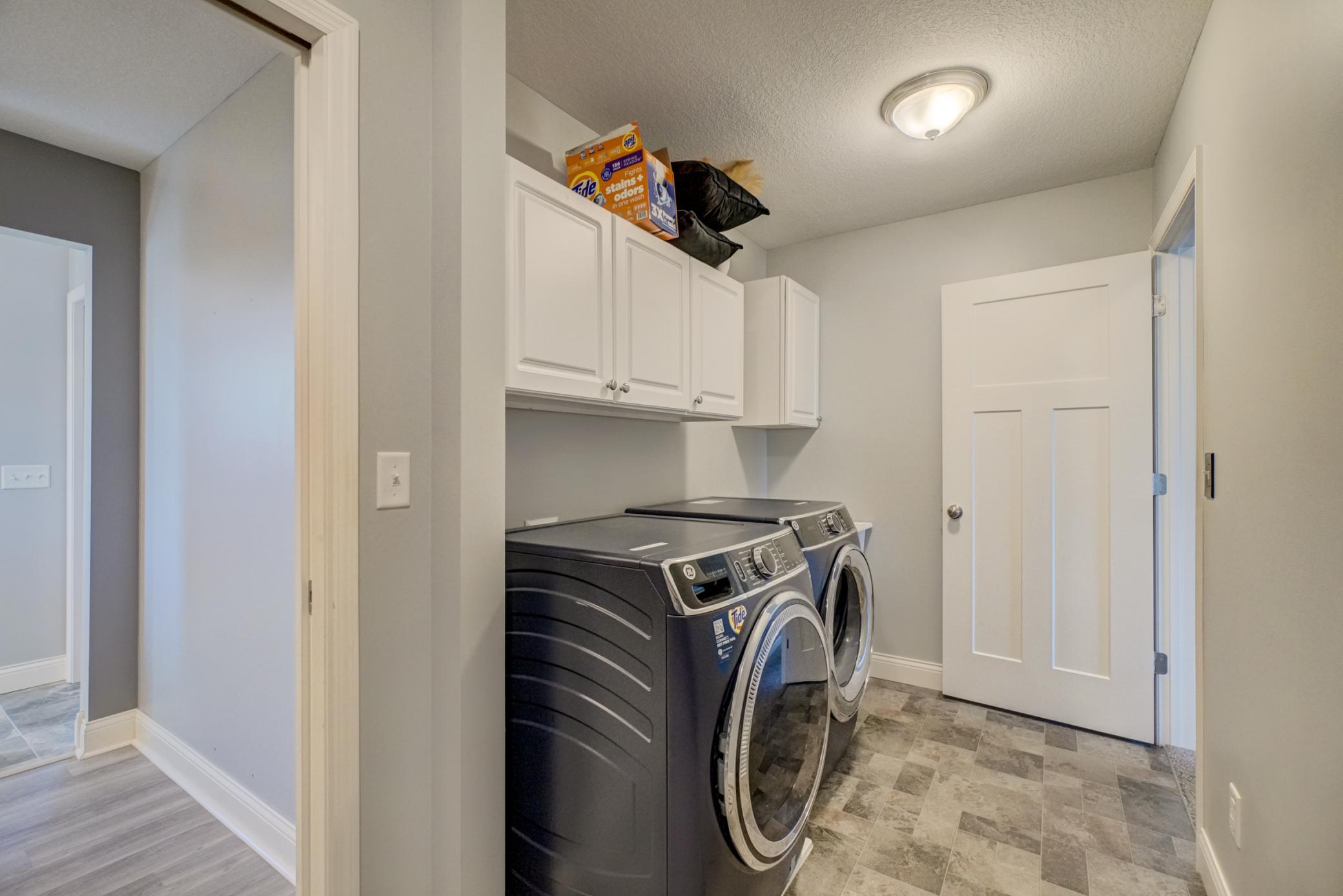 Well-appointed upper-level laundry making everyday living even easier!