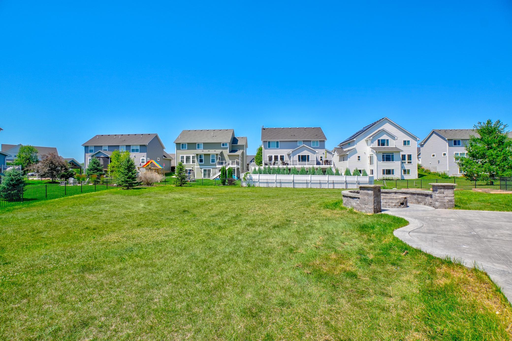 The beautifully landscaped, fully fenced backyard offers privacy and room to play!