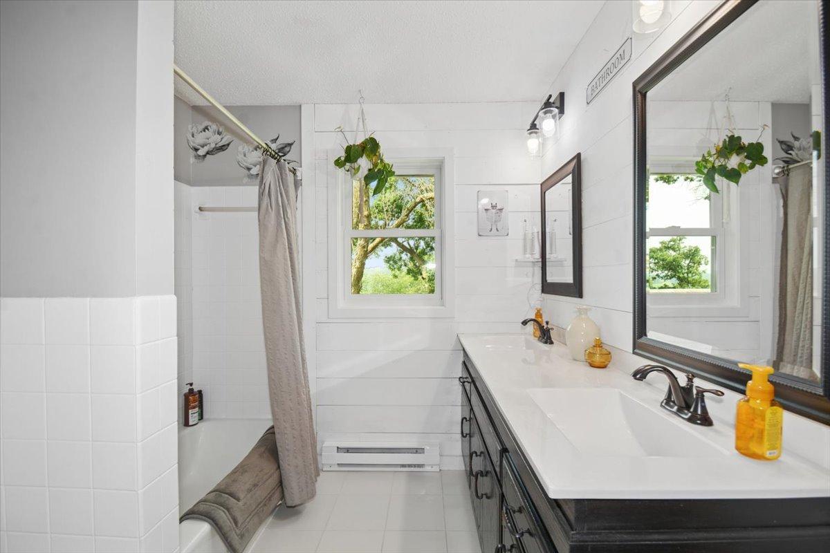 Full bath with double sinks