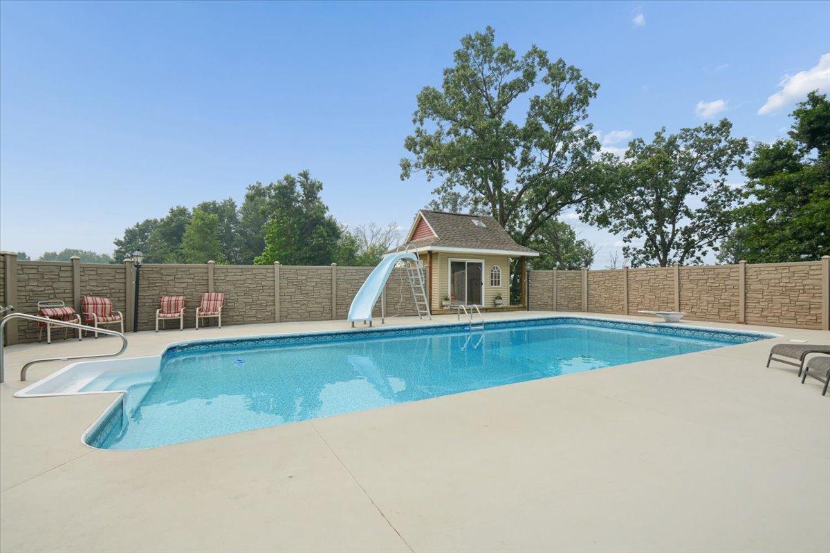 Great pool with pool house and slide