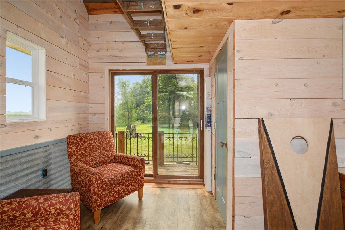 Inside pool house with 1/4 bath and sleeping loft