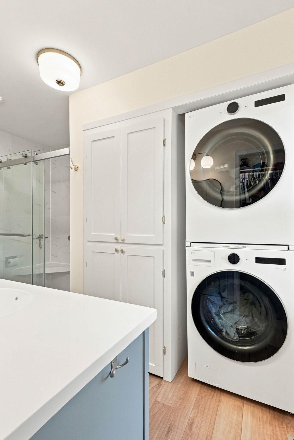 In unit laundry and custom cabinetry