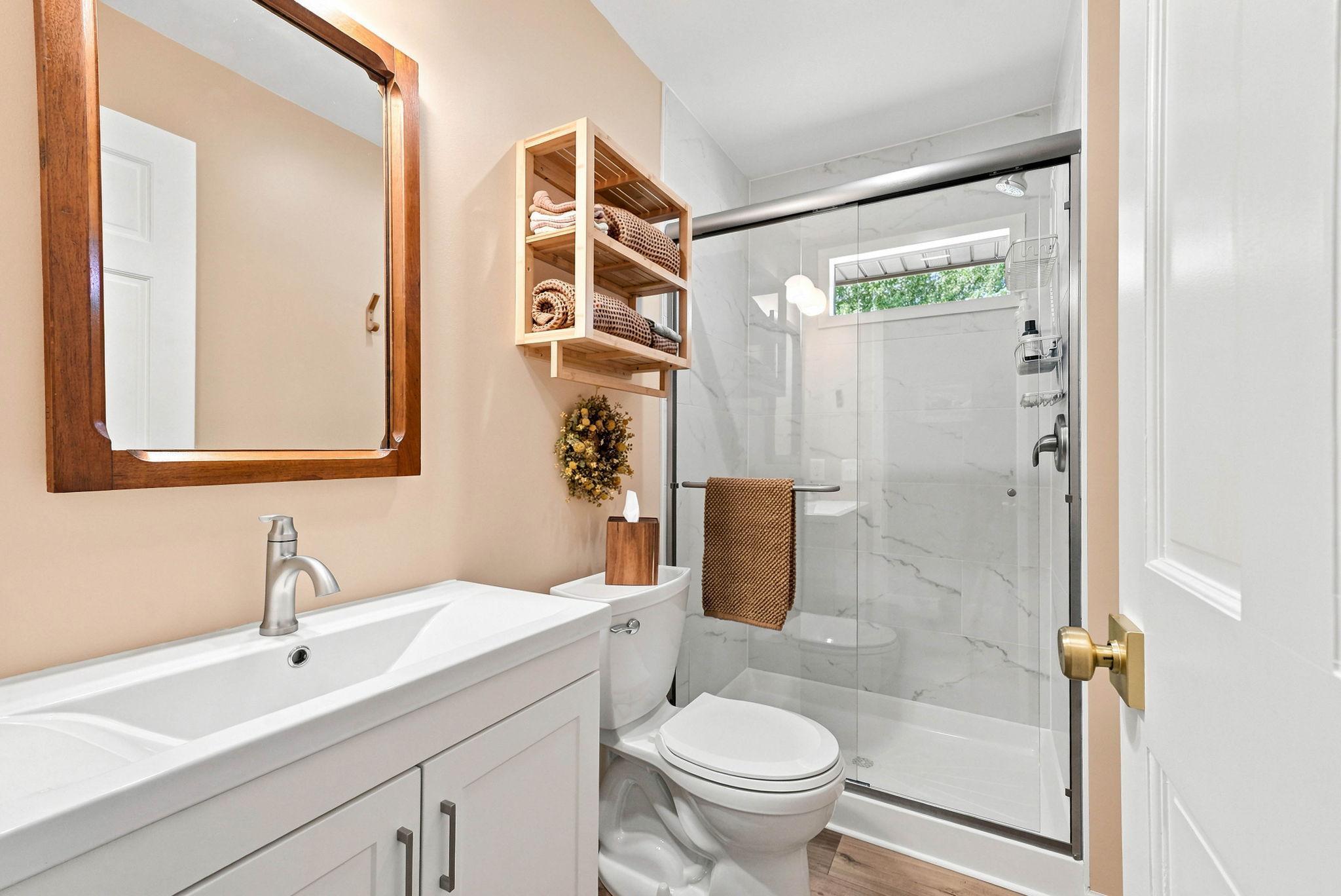 Mainfloor 3/4 bathroom has been fully renovated and is set to enjoy!