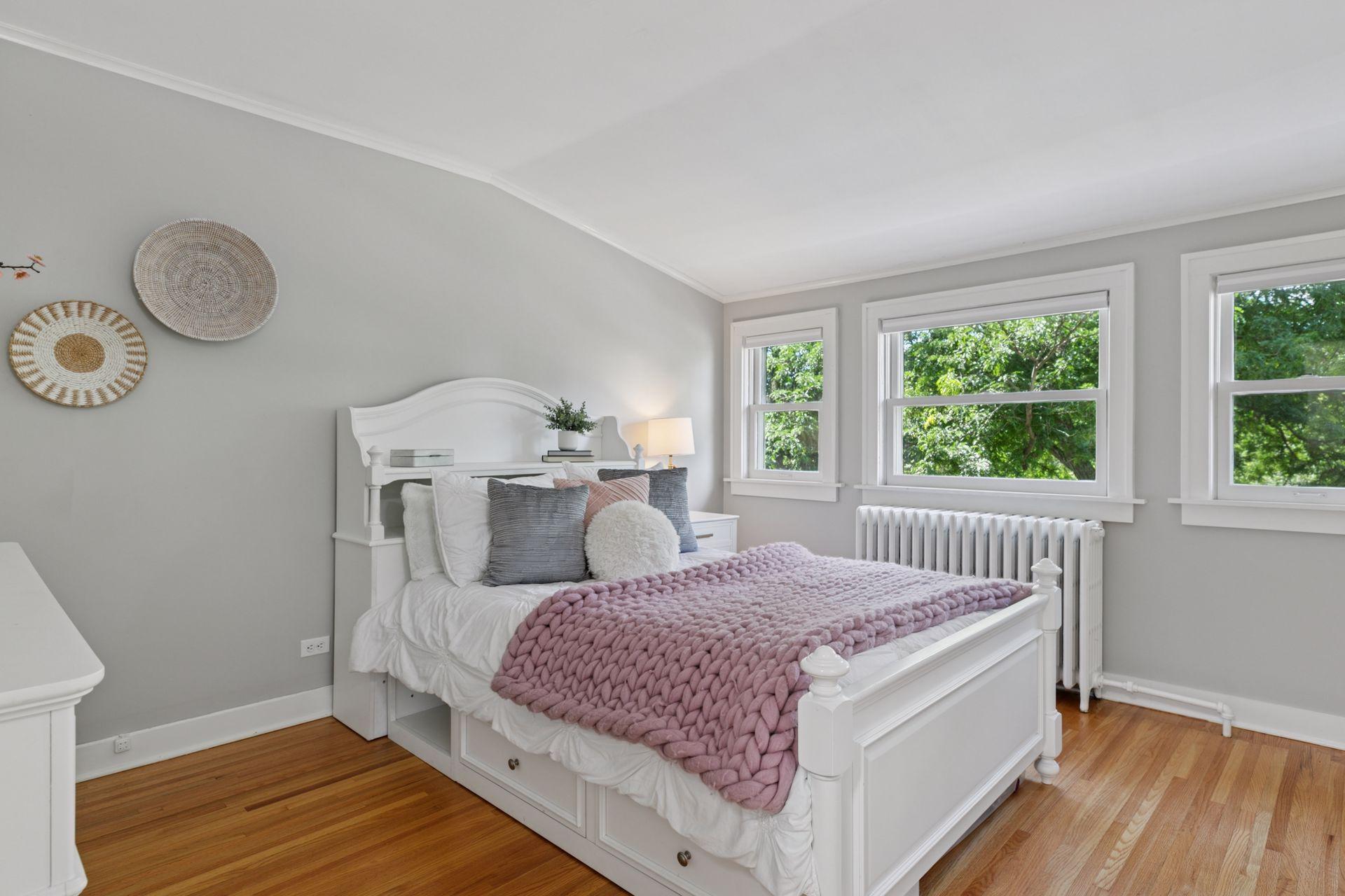 Master bedroom with hardwood floors