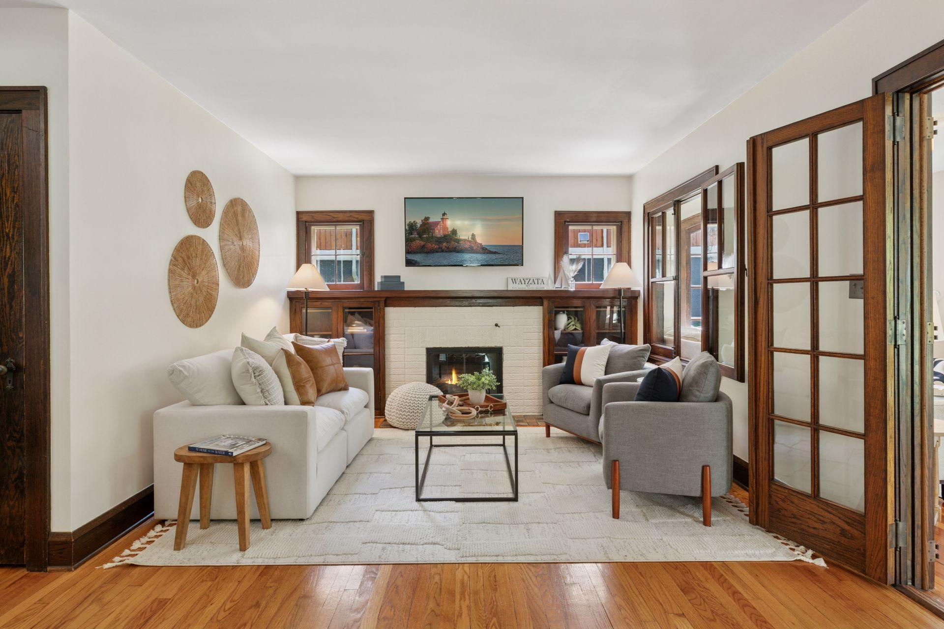 Living room with gas fireplace and built ins
