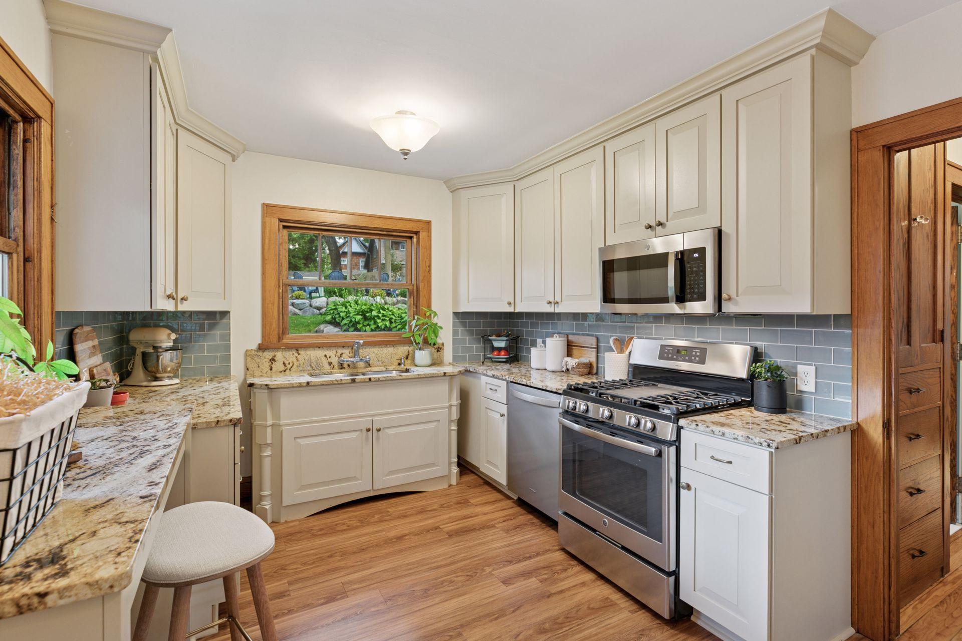 Kitchen with granite and stainless
