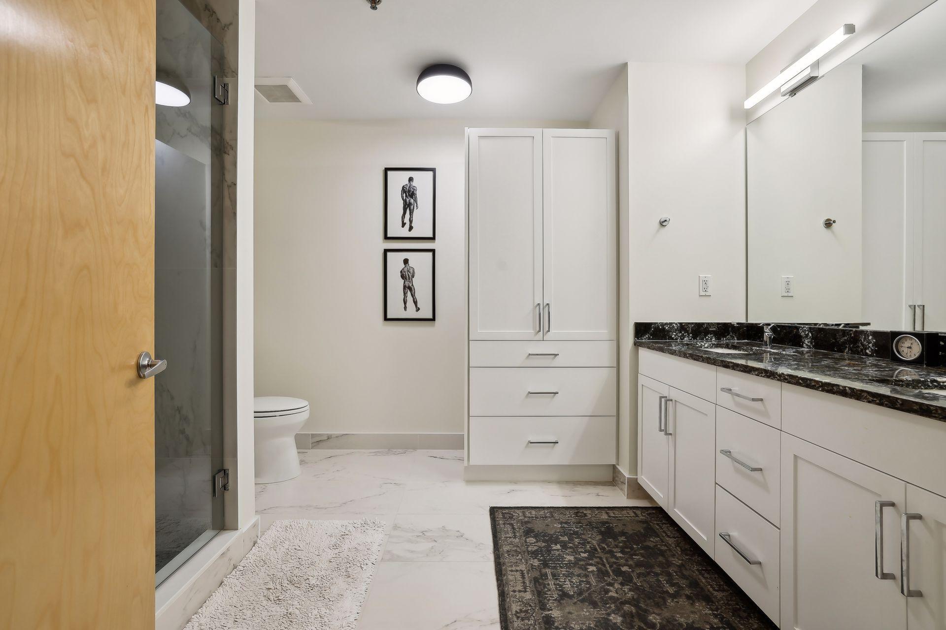 added linen closet and roll out drawers in bath