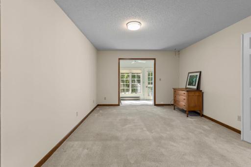 Main Level Primary Bedroom Leading to a Private Sun Room