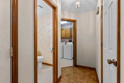 Main Level Half Bath, Additional Closet, and Laundry Just to the Left of the Foyer