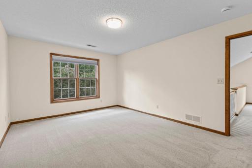 Upper Level Second Bedroom With New Carpeting