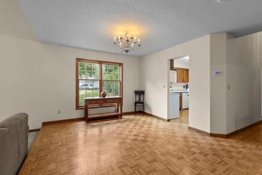 Formal Dining Area With Beautiful Parquet Flooring