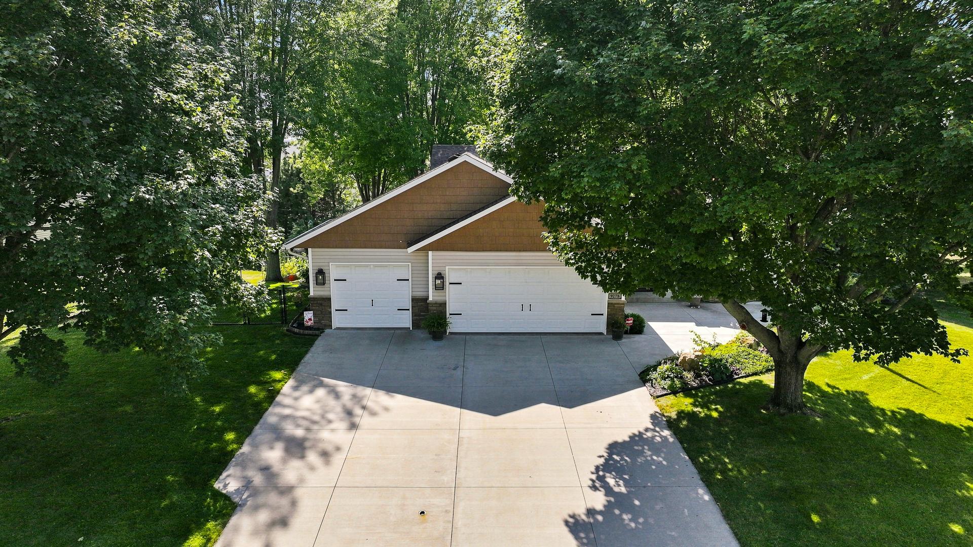 3-car insulated and heated garage, with reinforced ceiling for extra storage!