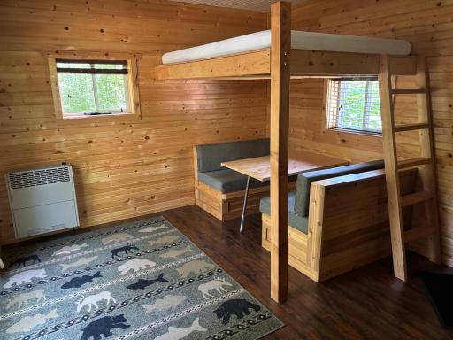 Propane heater on the wall in this picture.