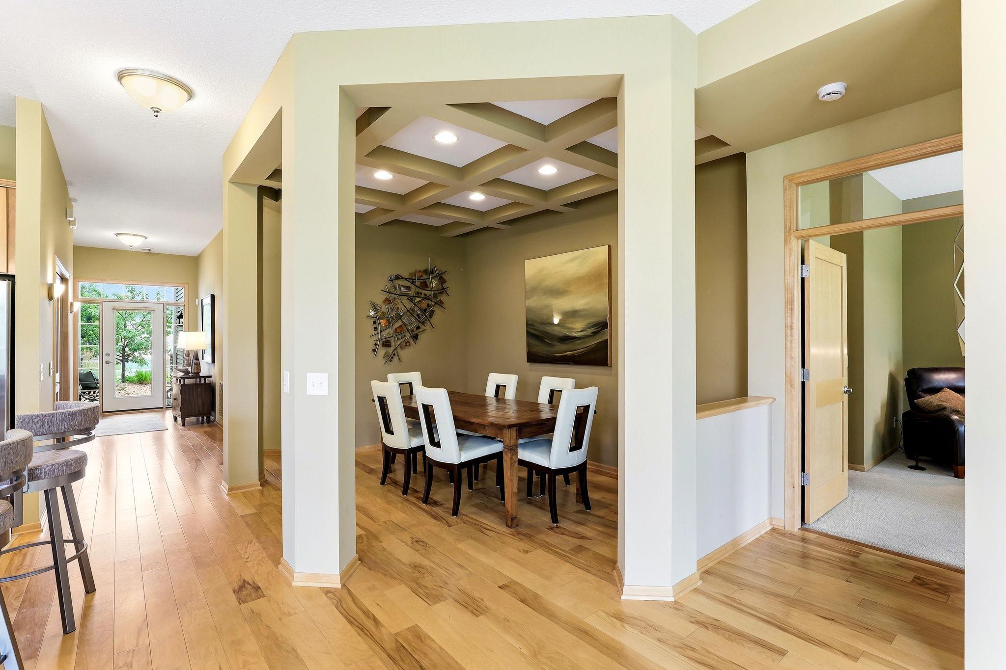 Light-tone flooring creates a soft, airy foundation that brightens every room. Its clean, modern look enhances the home’s open feel and complements any décor style.
