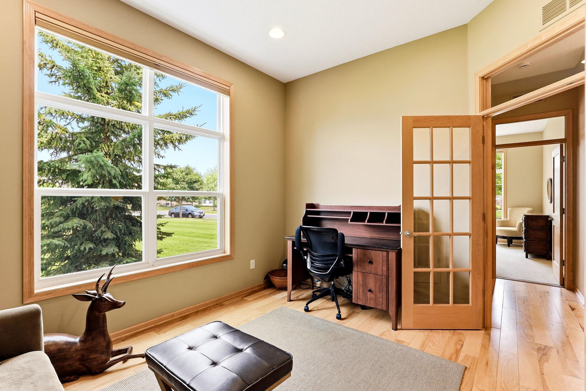 Stunning oversized window fills the workspace with natural light.