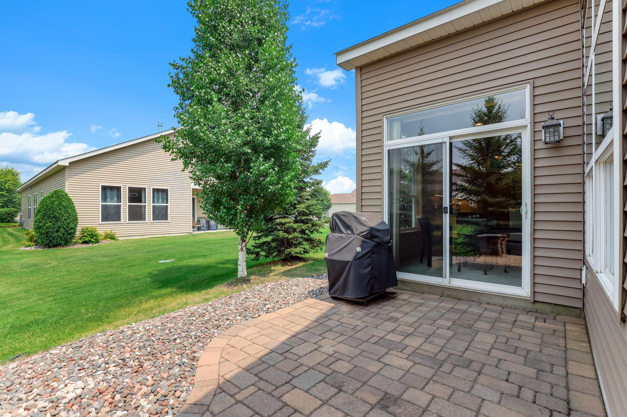 Paver patio offers a durable, stylish outdoor space perfect for dining, relaxing, and entertaining. Clean lines and solid craftsmanship create a polished backyard focal point.