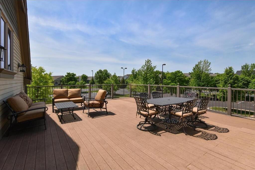 Spacious community deck and patios with comfortable seating and scenic views, perfect for relaxing or gathering with neighbors.