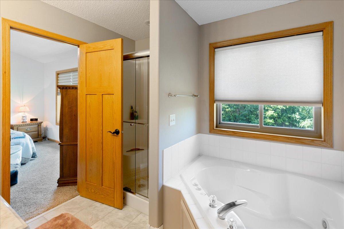 Primary bathroom with seperate tub and shower