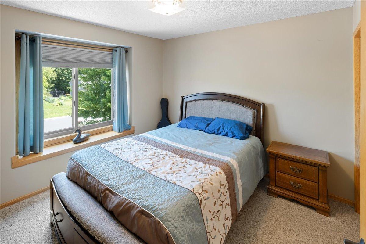 One of three upper level bedrooms