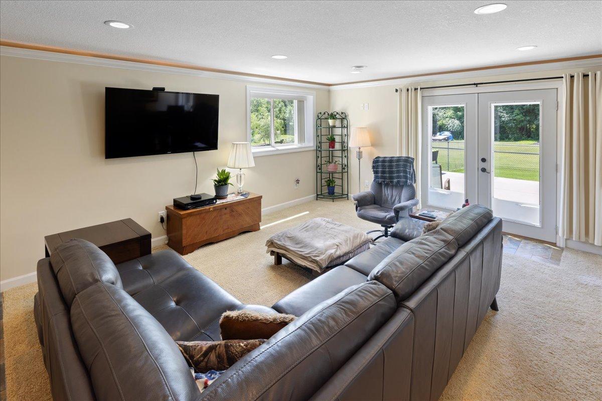 Lower level family room with walk out patio door