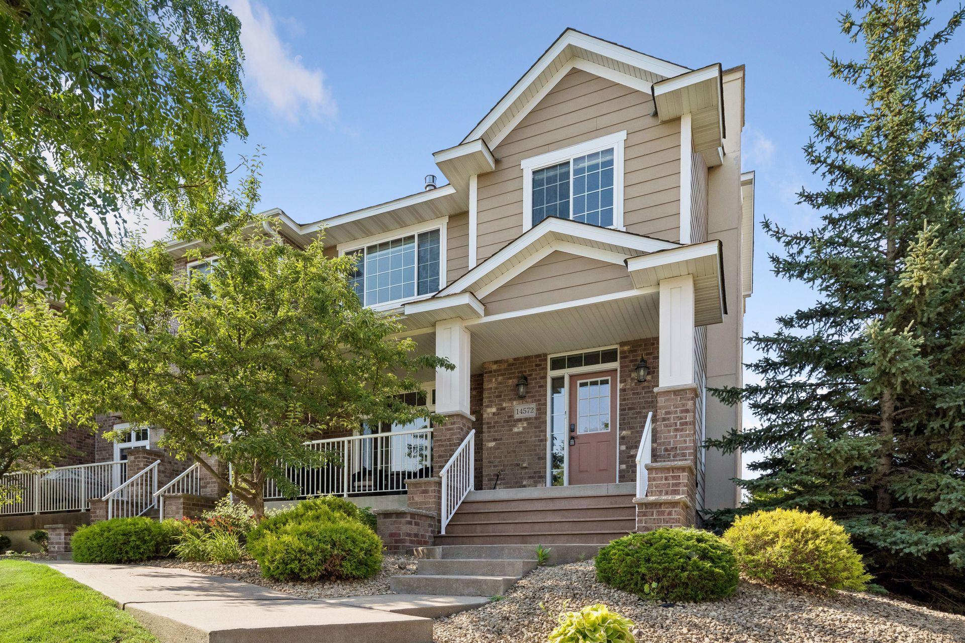 Another angle of your front doorstep. Great landscaping.