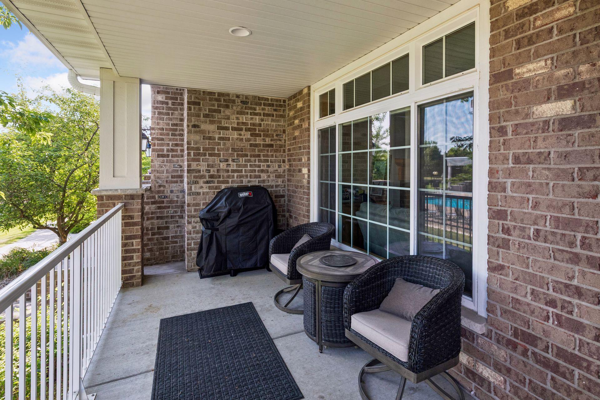 Adorable front porch and seating area.