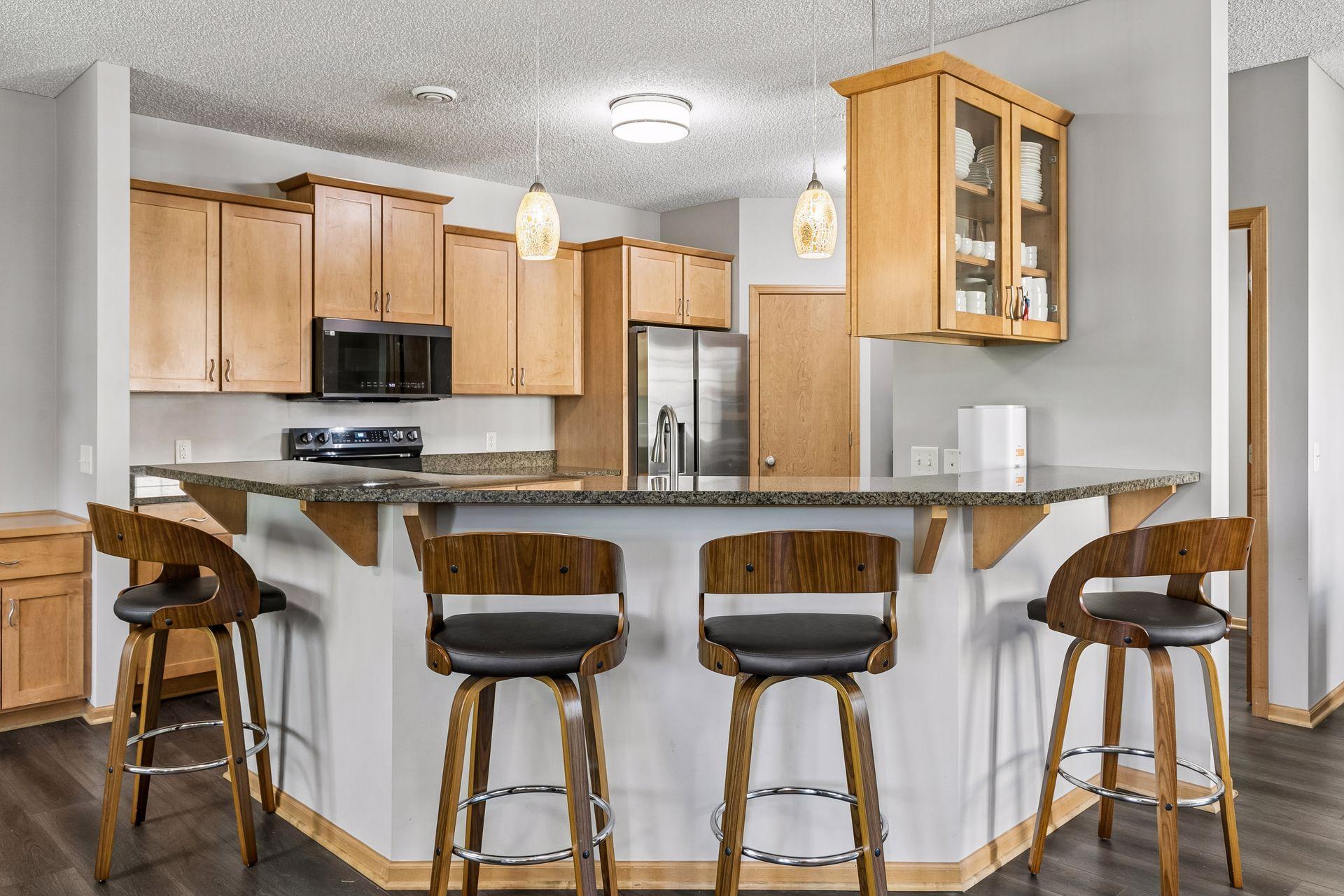 Close up view of your beautiful kitchen area with surplus of cabinet space and counter space.