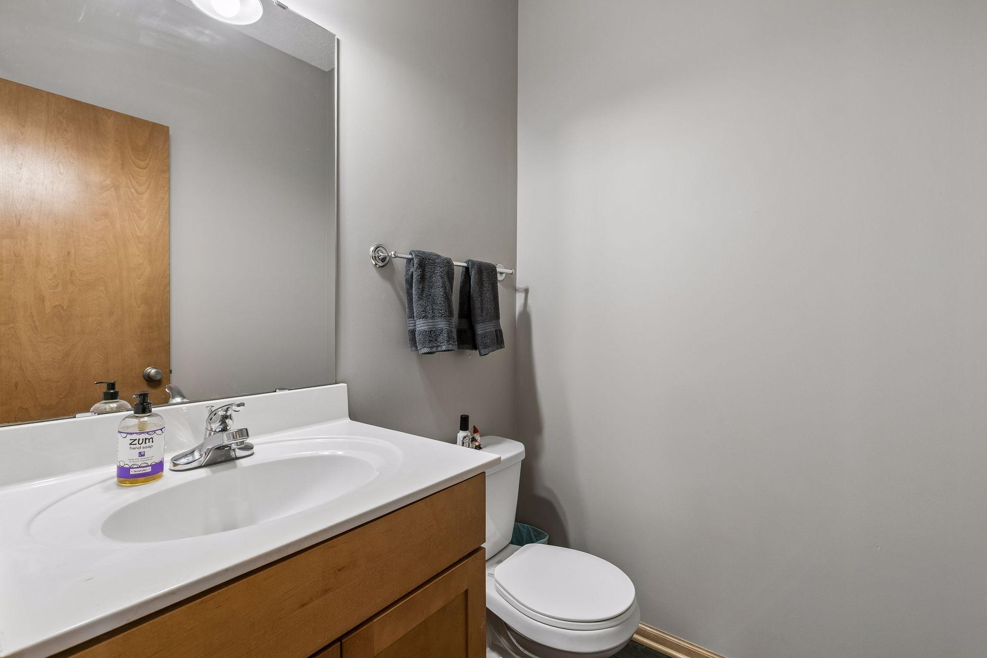Main floor half bath perfect for guest use.