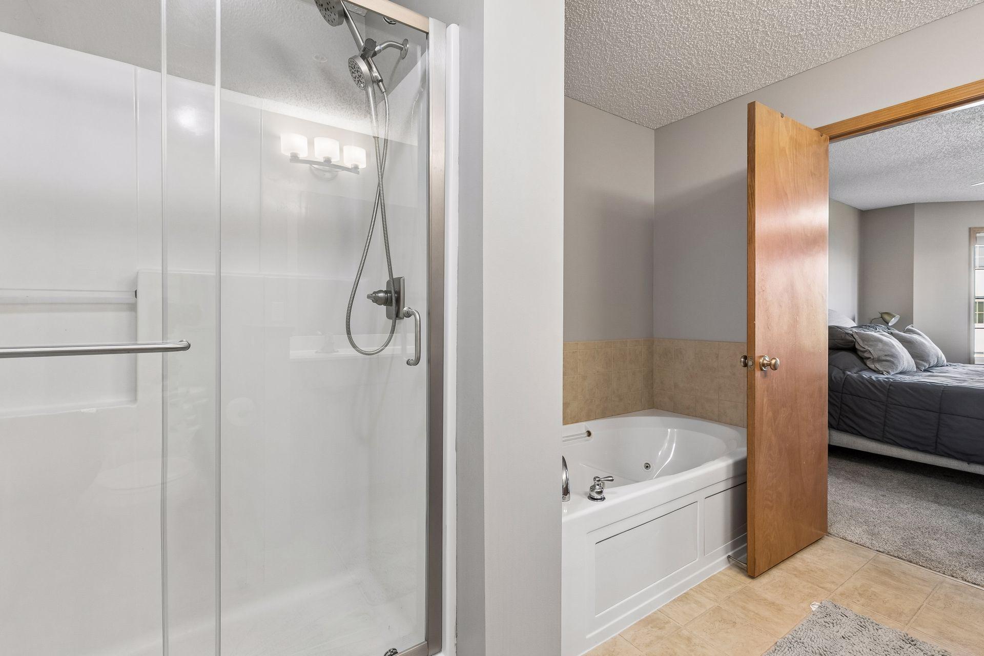 Shower and bathtub in your bathroom.