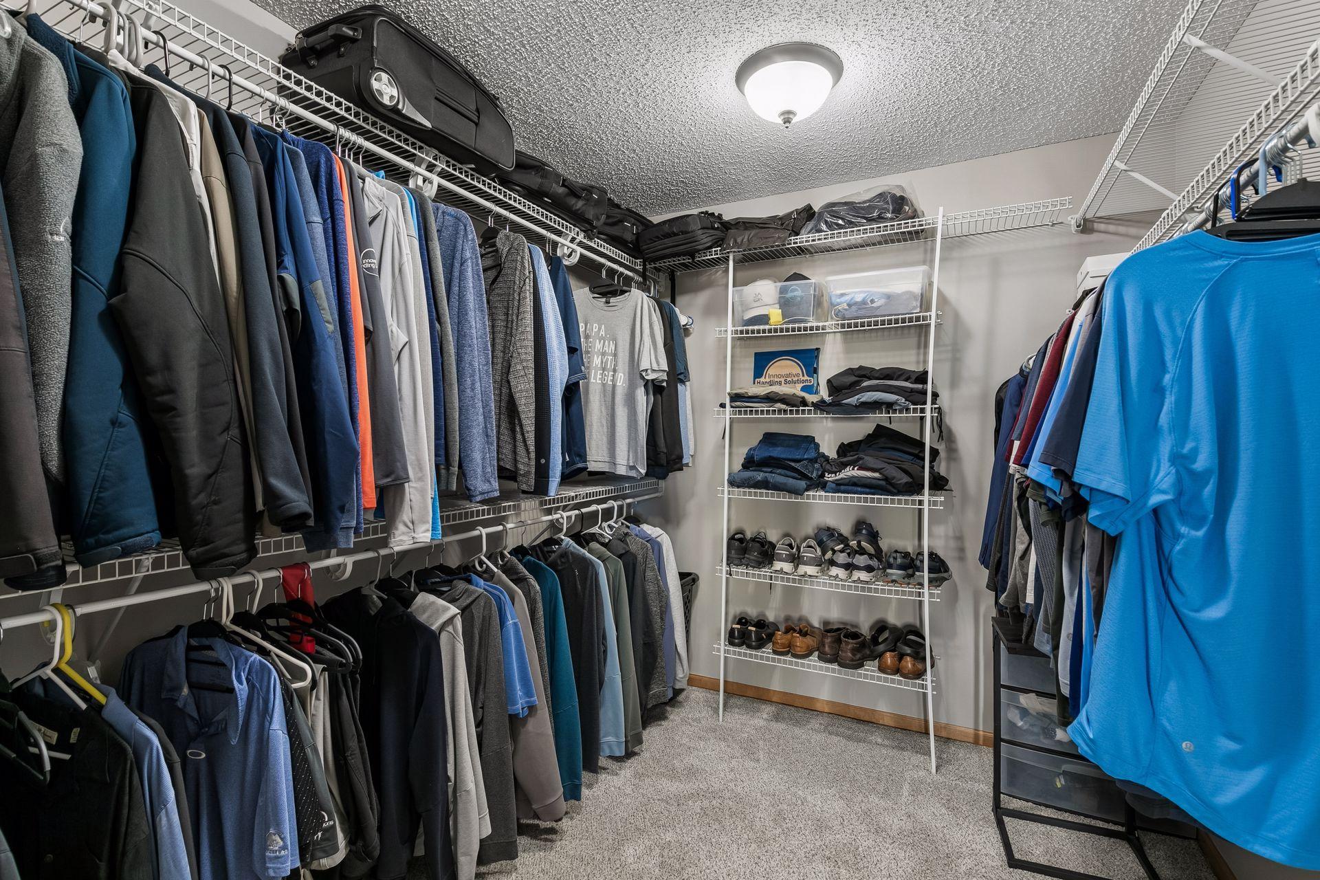 Nice walk-in closet. Plenty of space for storage and organization.