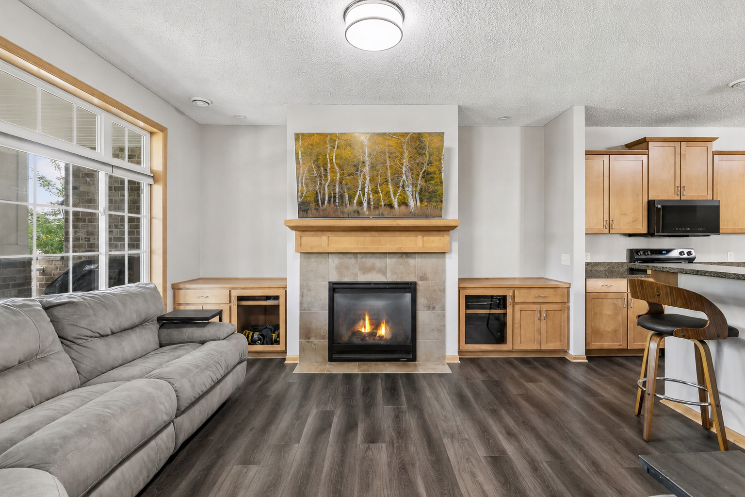 Warm cozy fireplace in your living area.