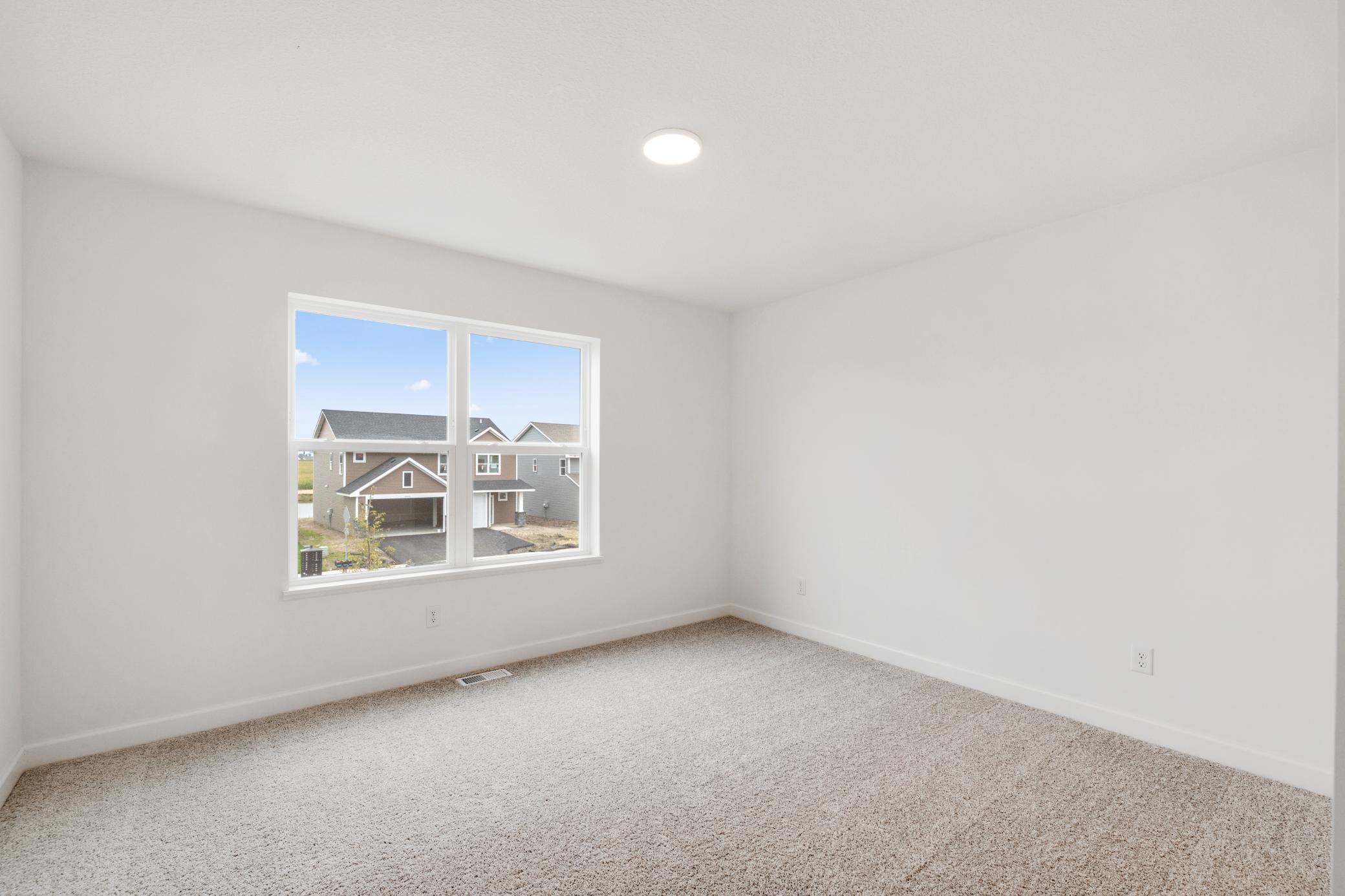 (Photo of a similar home, actual finishes may vary!)