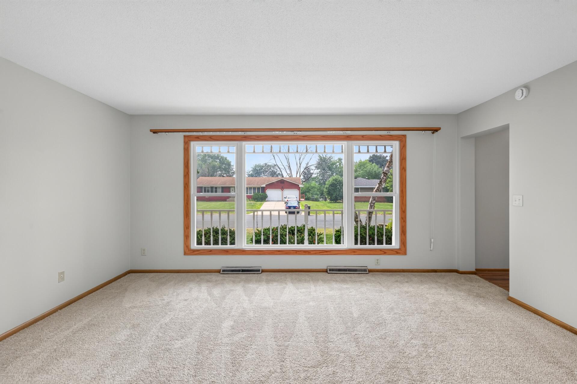 NEW maintenance free picture window in the living room area!